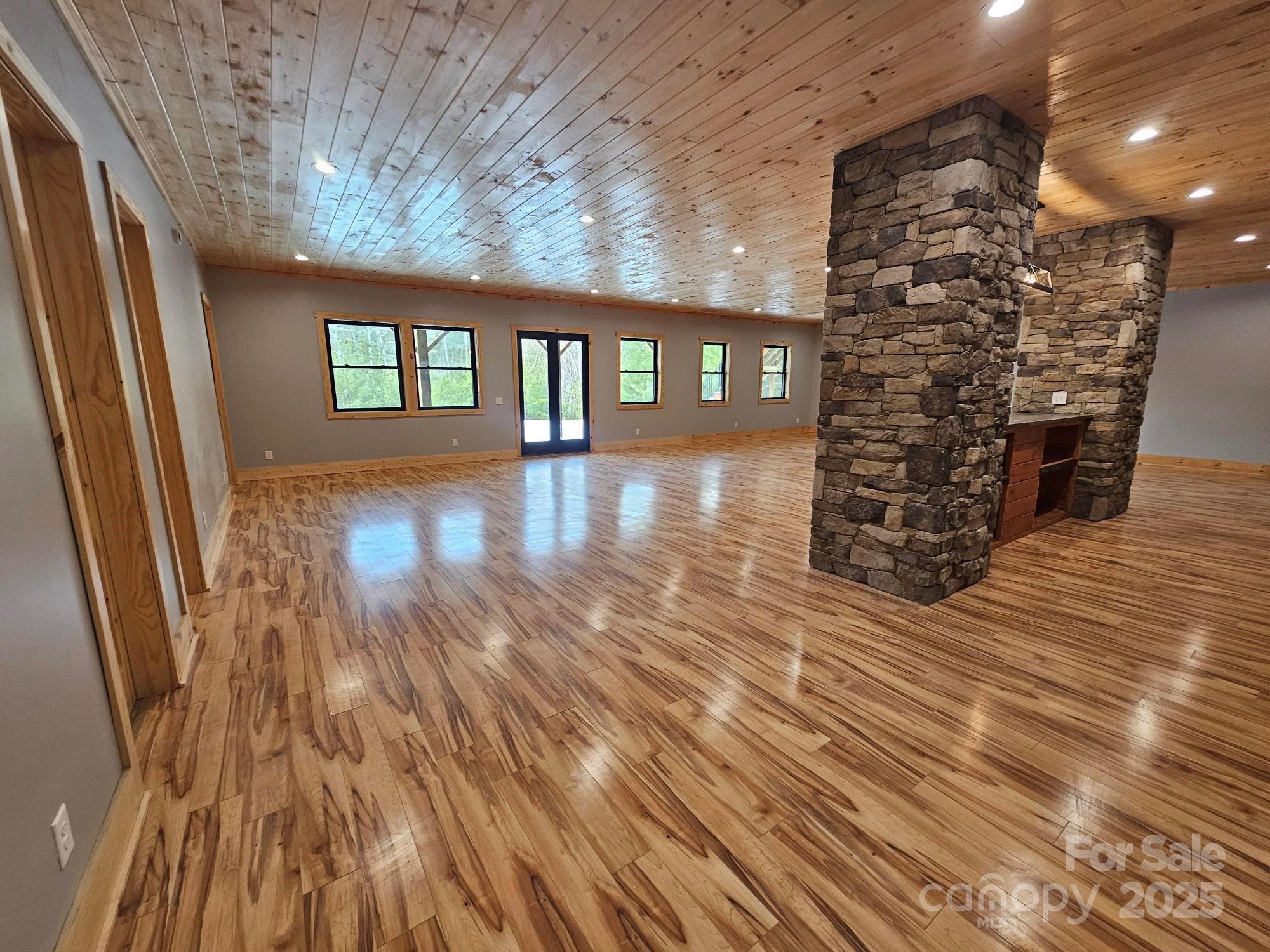 1076 Table View Drive, Unit 55 Morganton, NC 28655 - Photo 17 of 33 wooden floor in an empty room with a window
