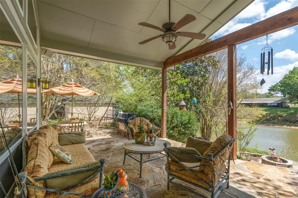 471 Stirrup Ranch Road Trinidad, TX 75163 - Photo 4 of 40 Back Patio, covered and with fans