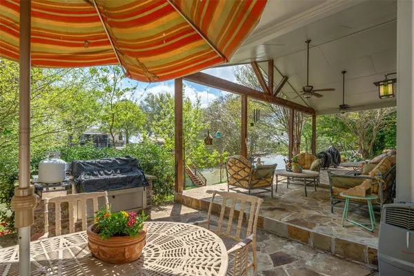 a outdoor space with lots of tables and chairs