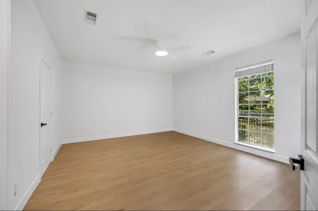 an empty room with windows