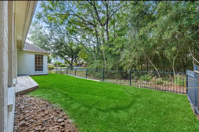 a view of a backyard with a garden