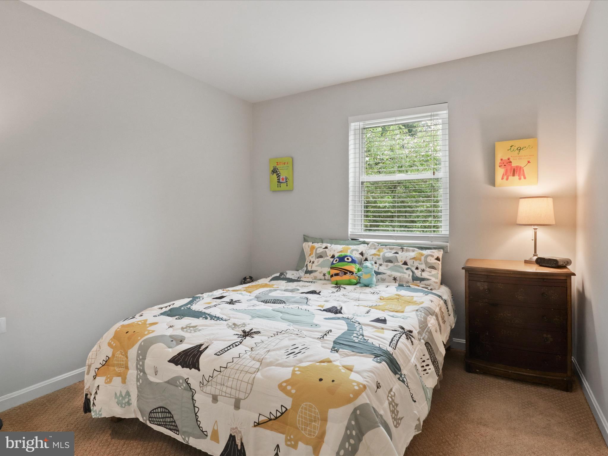 6558 Gildar Street Alexandria, VA 22310 - Photo 15 of 53 a bedroom with a bed and a window