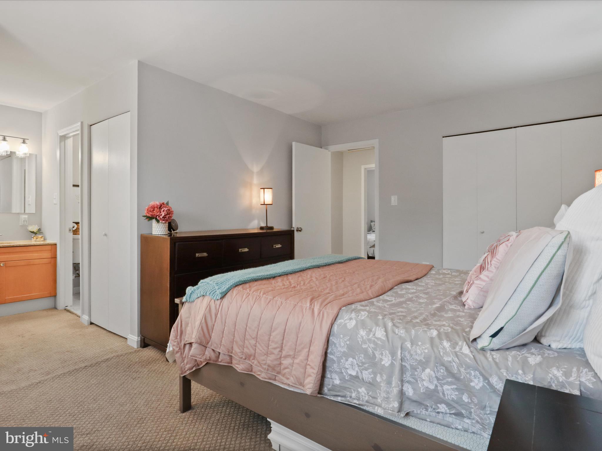 6558 Gildar Street Alexandria, VA 22310 - Photo 18 of 53 a bedroom with a bed and a cabinets