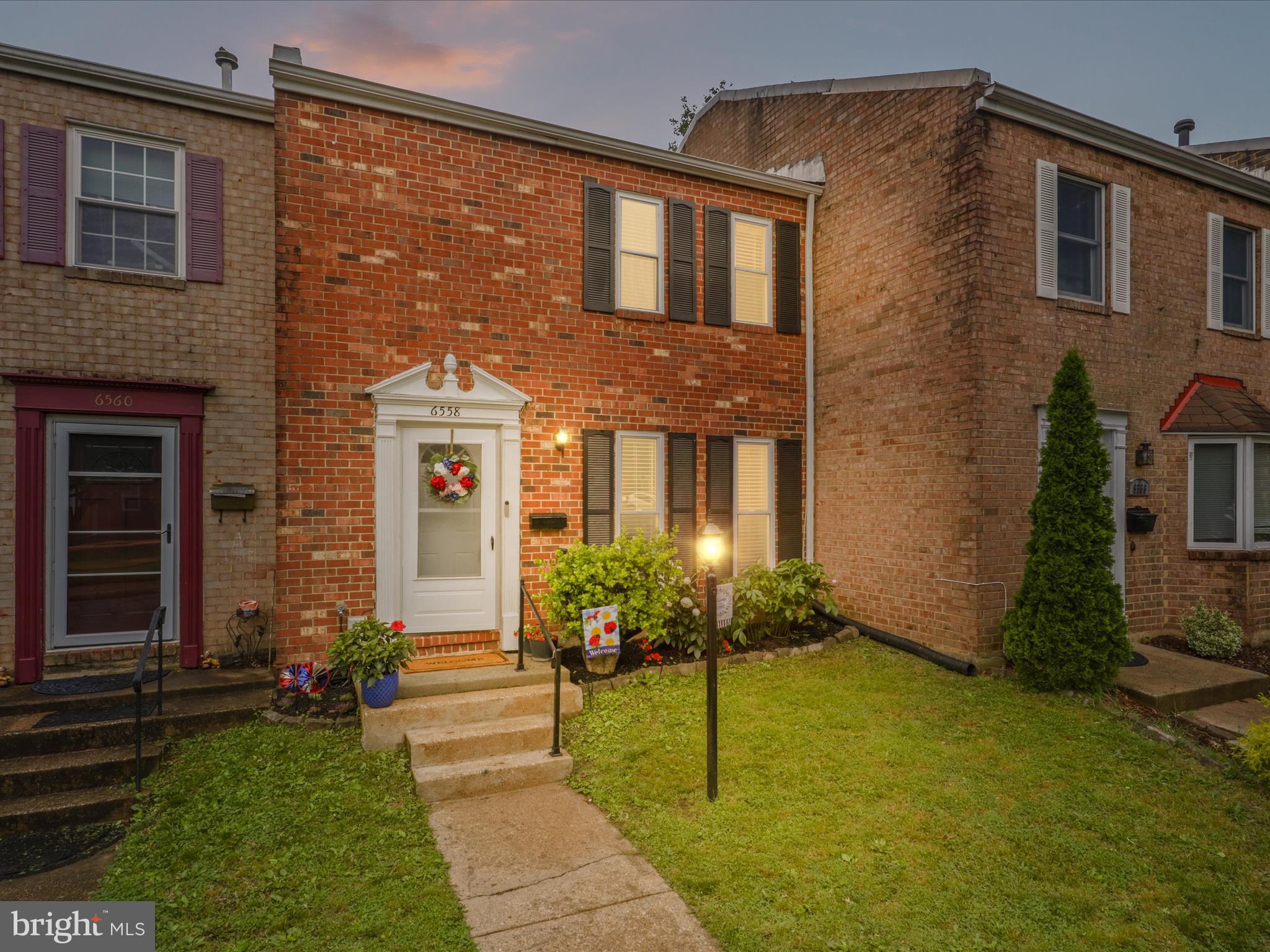 6558 Gildar Street Alexandria, VA 22310 - Photo 2 of 53 a front view of a house with garden