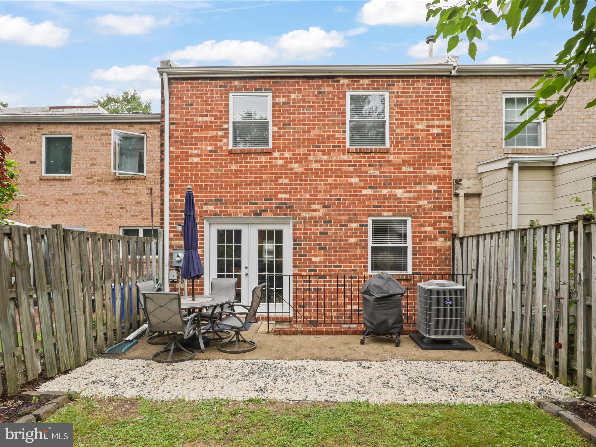 6558 Gildar Street Alexandria, VA 22310 - Photo 28 of 53 a view of backyard of house with seating space