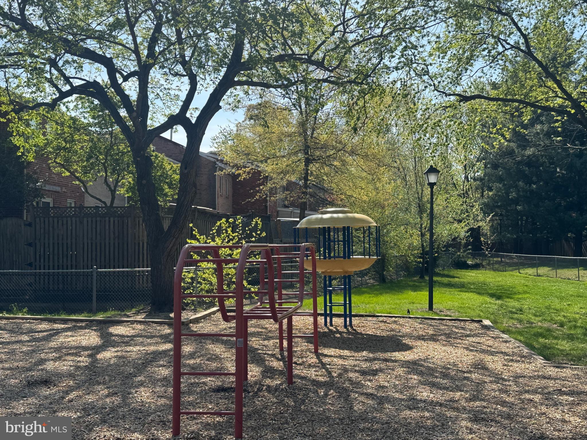 6558 Gildar Street Alexandria, VA 22310 - Photo 37 of 53 a view of a bench in a backyard
