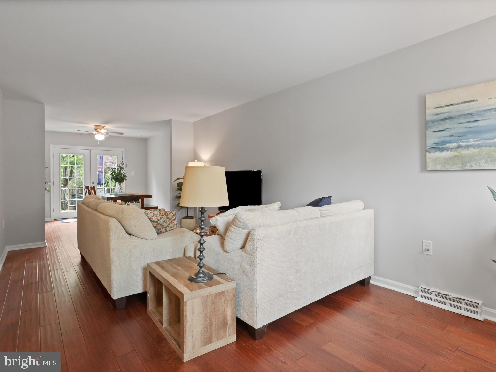 6558 Gildar Street Alexandria, VA 22310 - Photo 5 of 53 a living room with furniture and a wooden floor