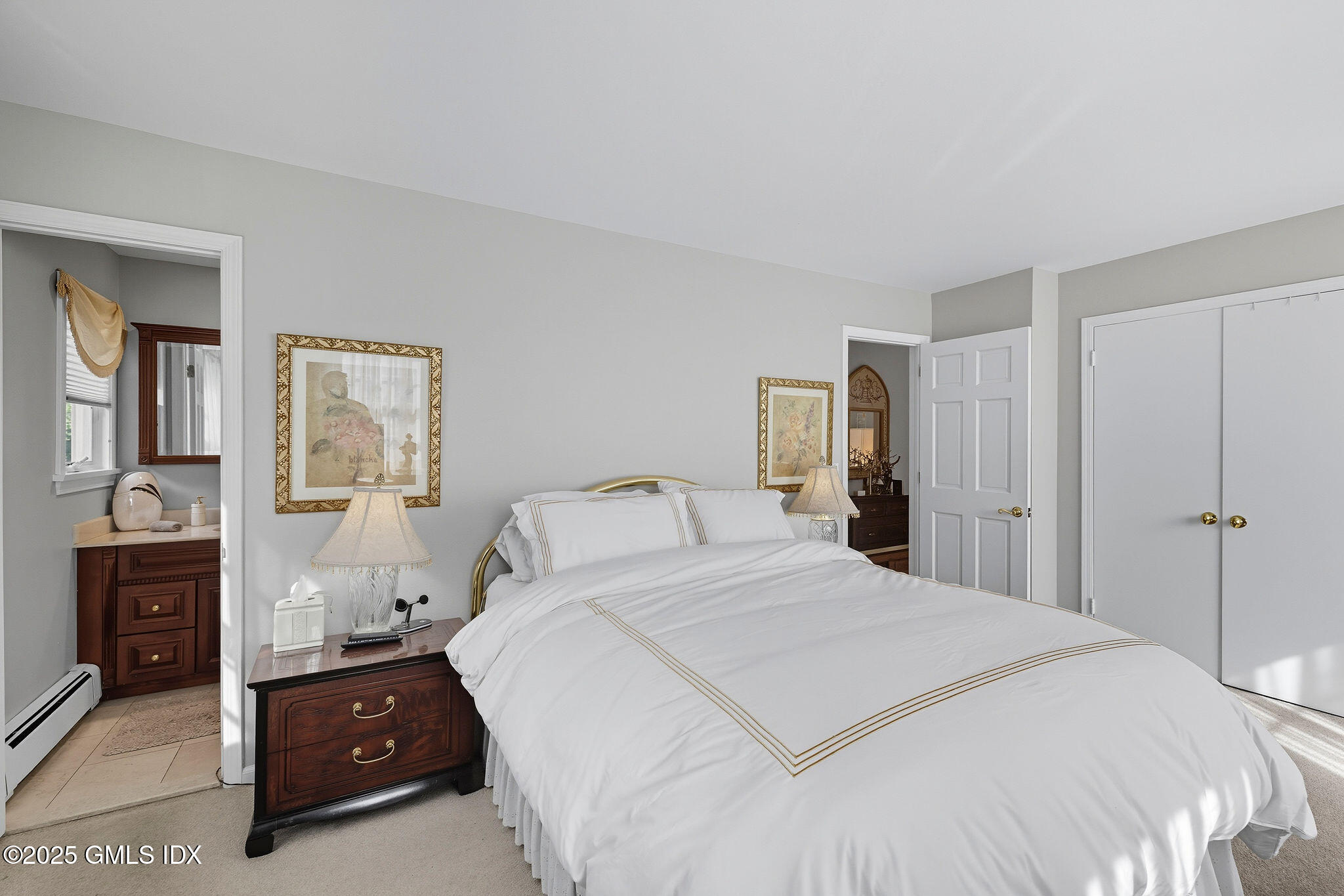 25 Buxton Lane Riverside, CT 06878 - Photo 12 of 16 a bedroom with a bed and a closet