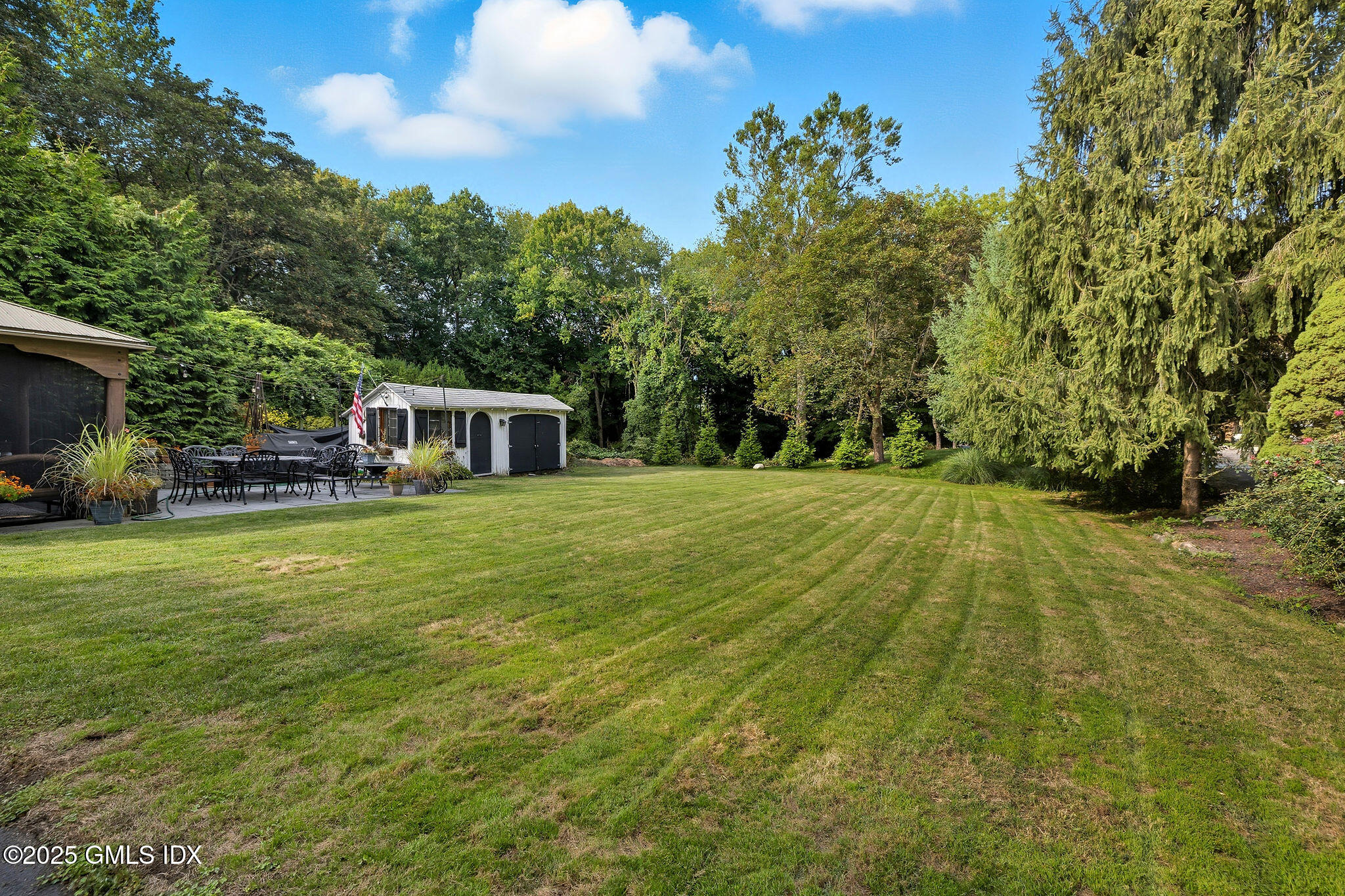 25 Buxton Lane Riverside, CT 06878 - Photo 16 of 16 a house view with swimming pool in front of it