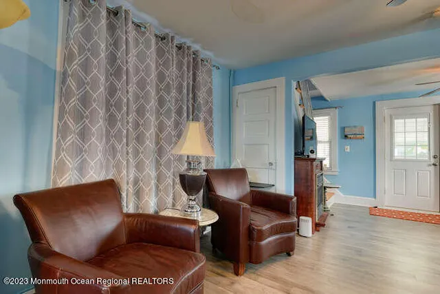 a kitchen with a sink stove and microwave