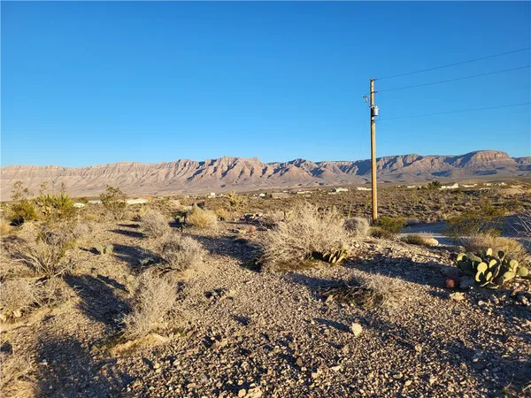 a view of mountain view with mountains in the background