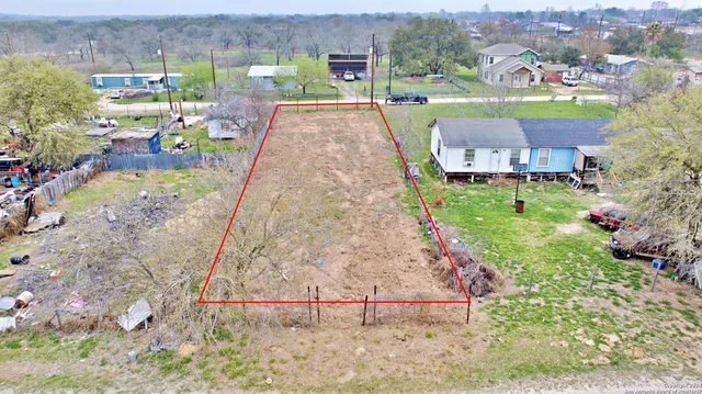 a bird view of building and yard