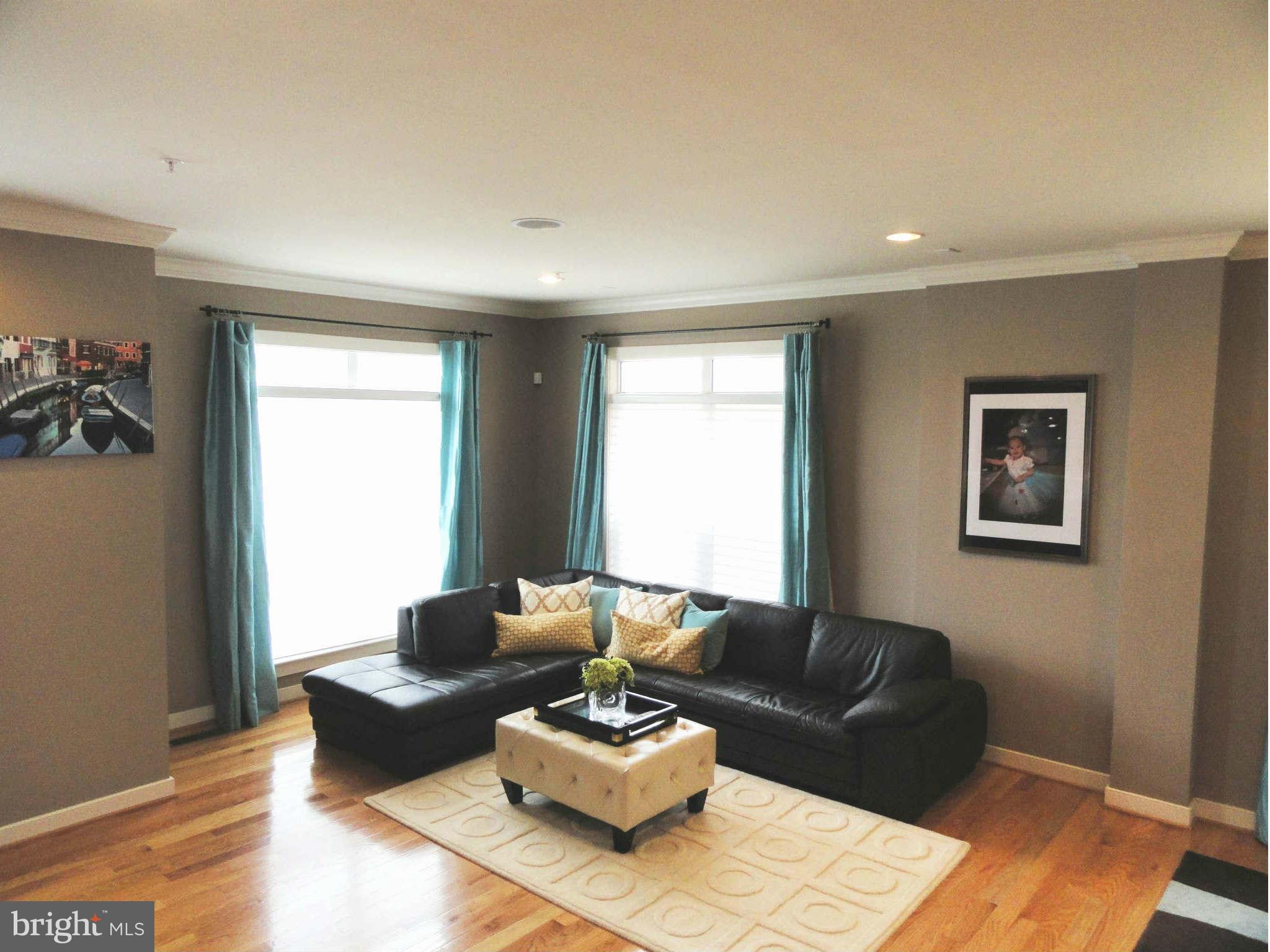 4159 Legato Road Fairfax, VA 22033 - Photo 3 of 25 a living room with furniture and a window