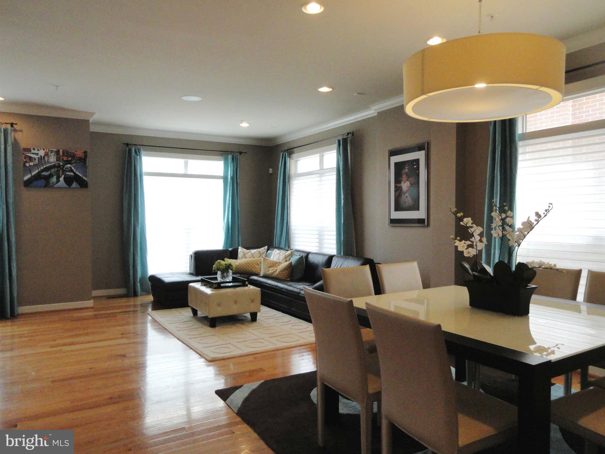 4159 Legato Road Fairfax, VA 22033 - Photo 5 of 25 a living room with furniture and a table