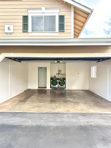a view of a kitchen with a sink and dishwasher