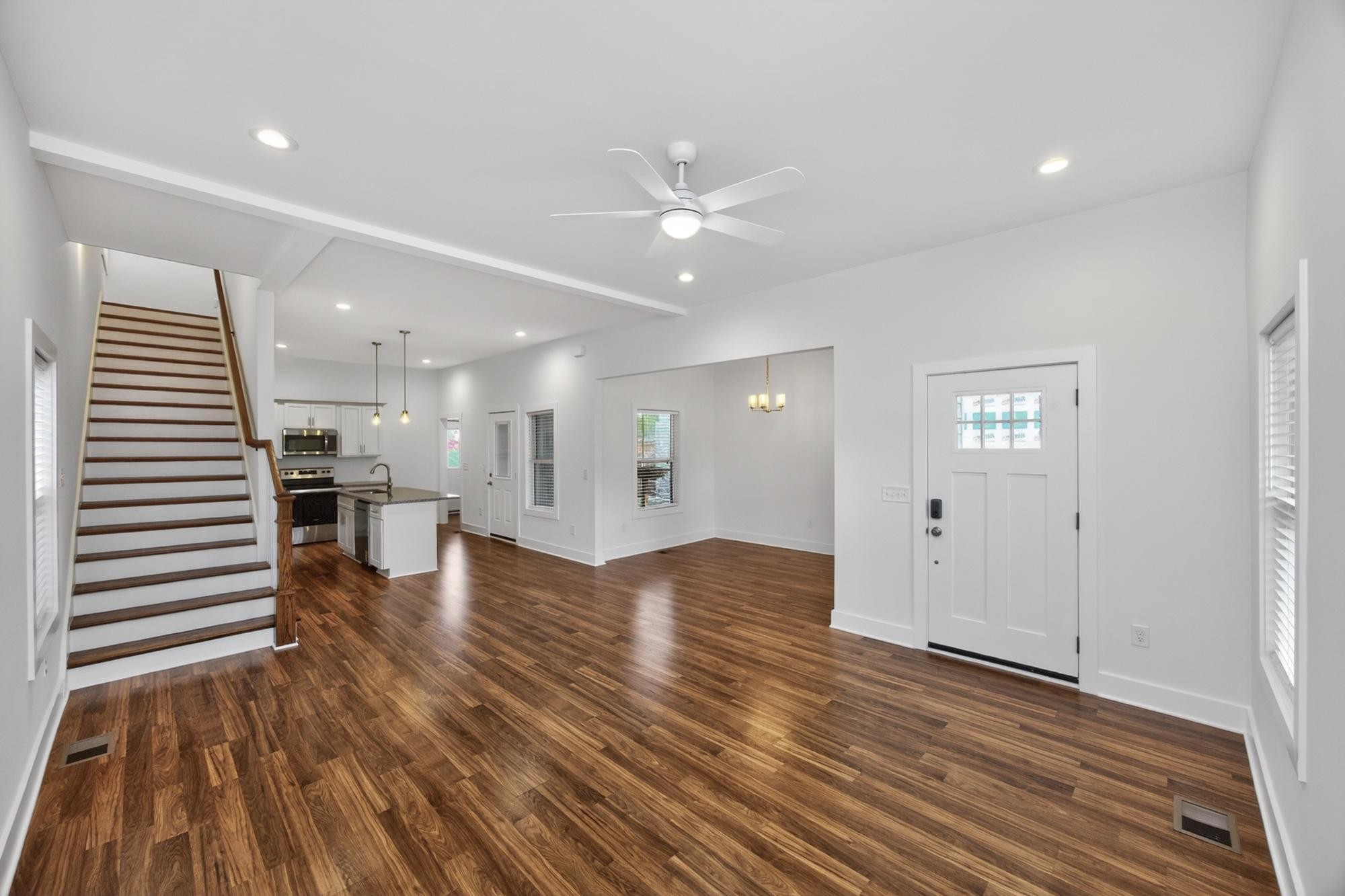 7 Decatur Street Nashville, TN 37210 - Photo 3 of 43 a view of a kitchen with wooden floor and a ceiling fan