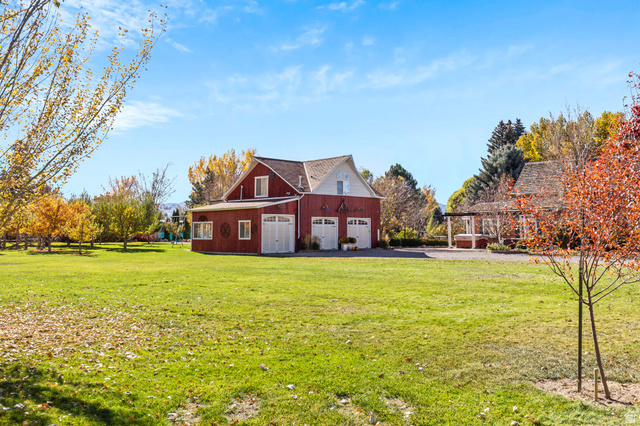 390 North 100 West Monroe, UT 84754 - Photo 28 of 167 Back of house featuring a yard, an outbuilding, and a barn