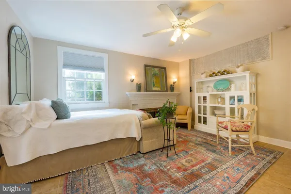 a kitchen with stainless steel appliances kitchen island granite countertop a refrigerator and microwave