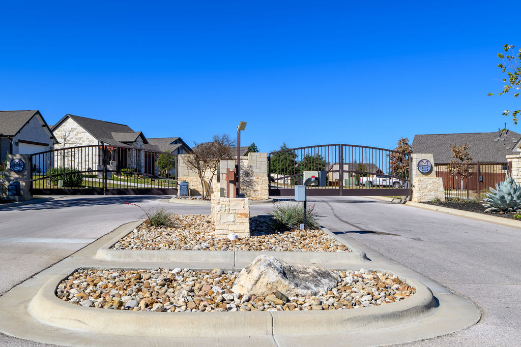 320 Morning Ridge Georgetown, TX 78628 - Photo 5 of 9 a view of a street with a building in the background