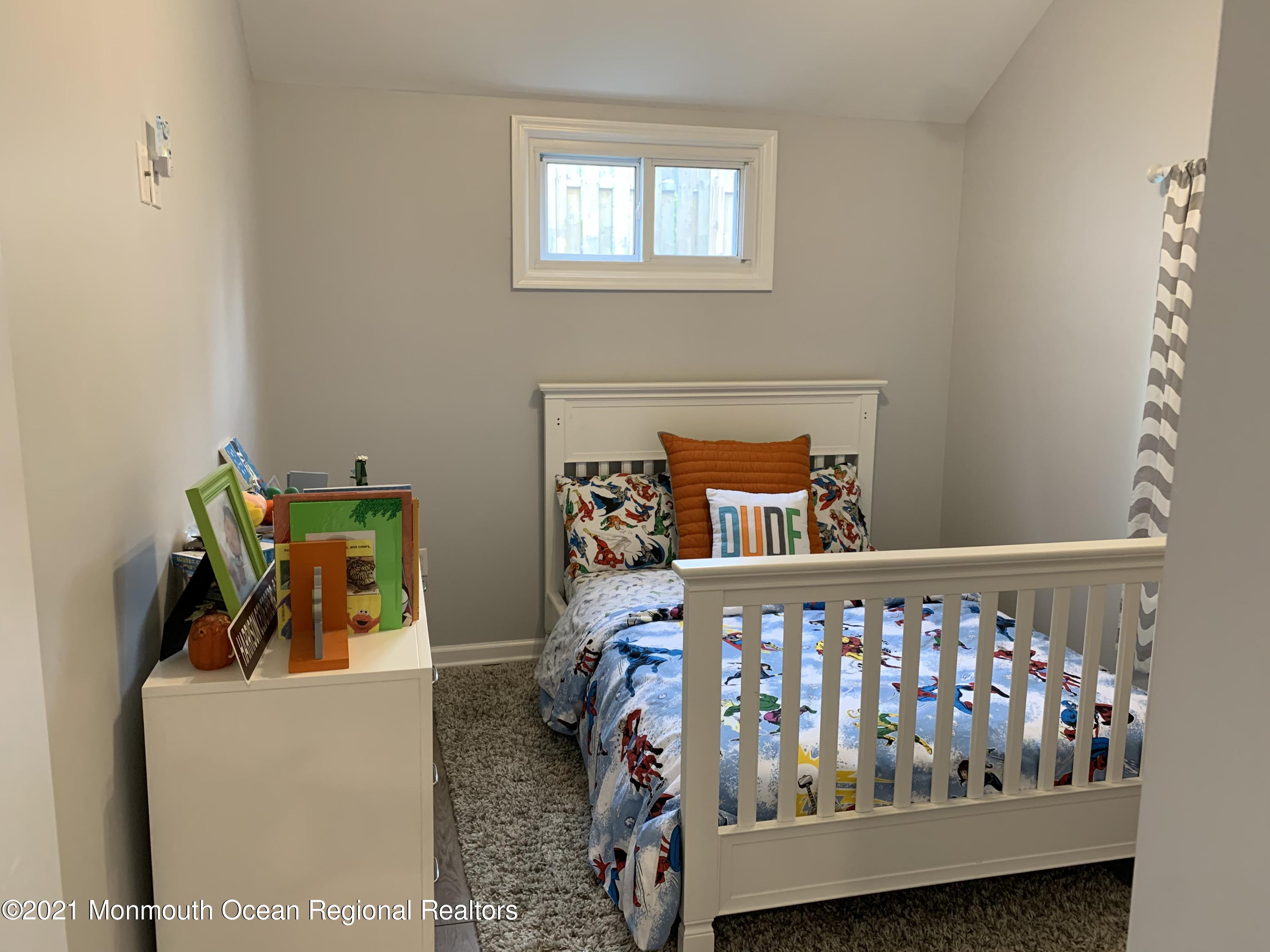 34 Forrest Avenue Rumson, NJ 07760 - Photo 15 of 22 a bedroom with furniture and a window