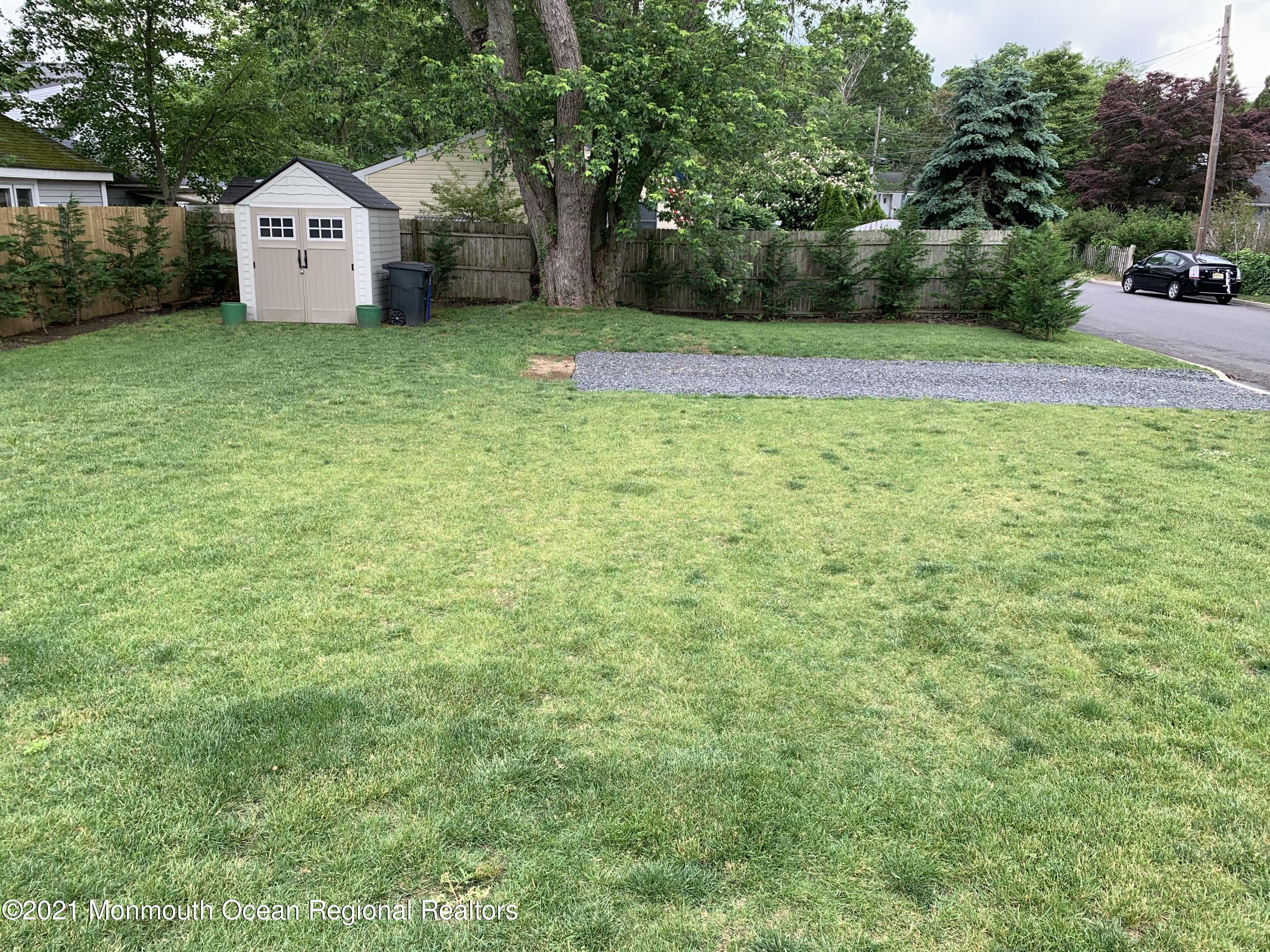 34 Forrest Avenue Rumson, NJ 07760 - Photo 19 of 22 a view of a house with backyard and garden