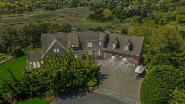 a bedroom with a large bed and a flat screen tv