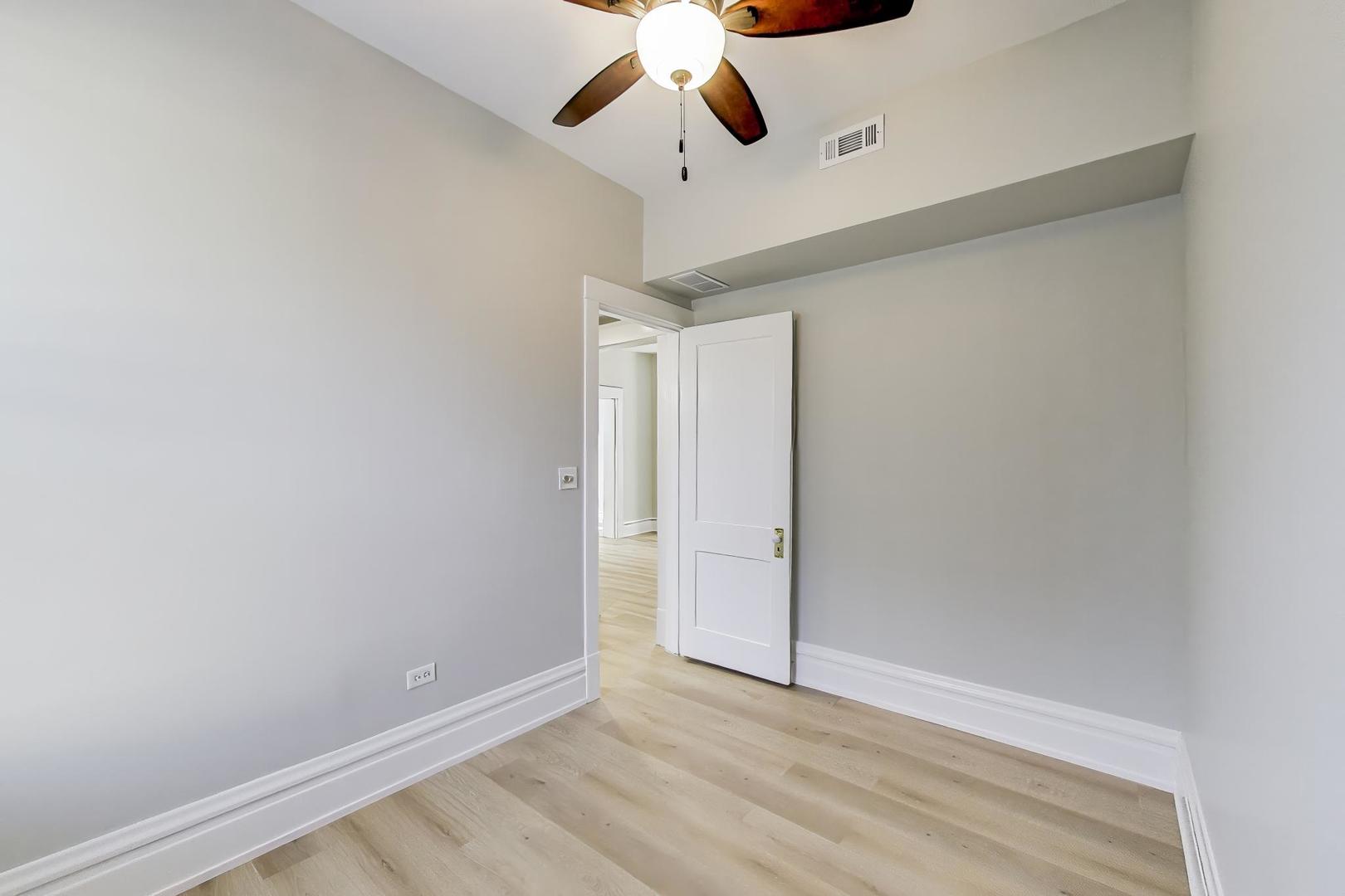 2114 West Byron Street, Unit 1 Chicago, IL 60618 - Photo 20 of 23 a view of an empty room