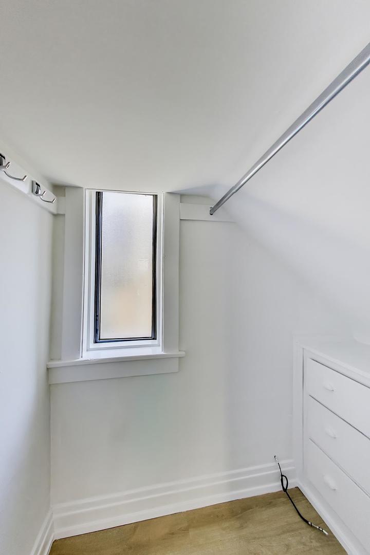 2114 West Byron Street, Unit 1 Chicago, IL 60618 - Photo 22 of 23 a view of a room that has a window in it