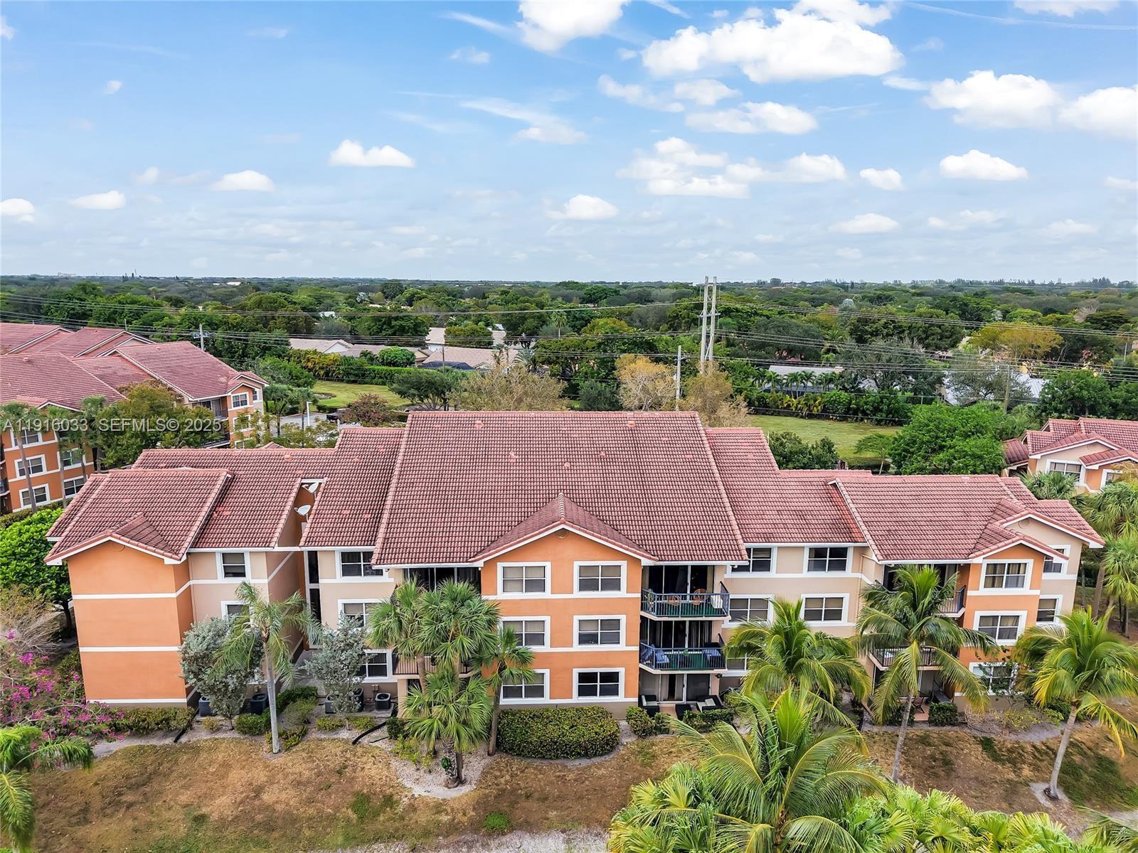 an aerial view of house with yard