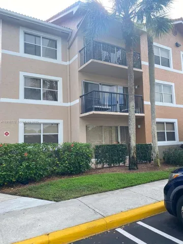 a front view of a house with swimming pool