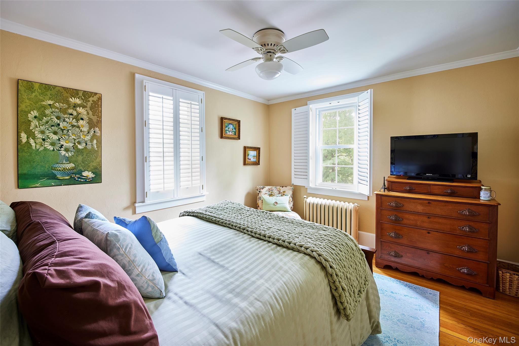 11 Harding Lane Roscoe, NY 12776 - Photo 39 of 48 a bedroom with a bed and a flat screen tv