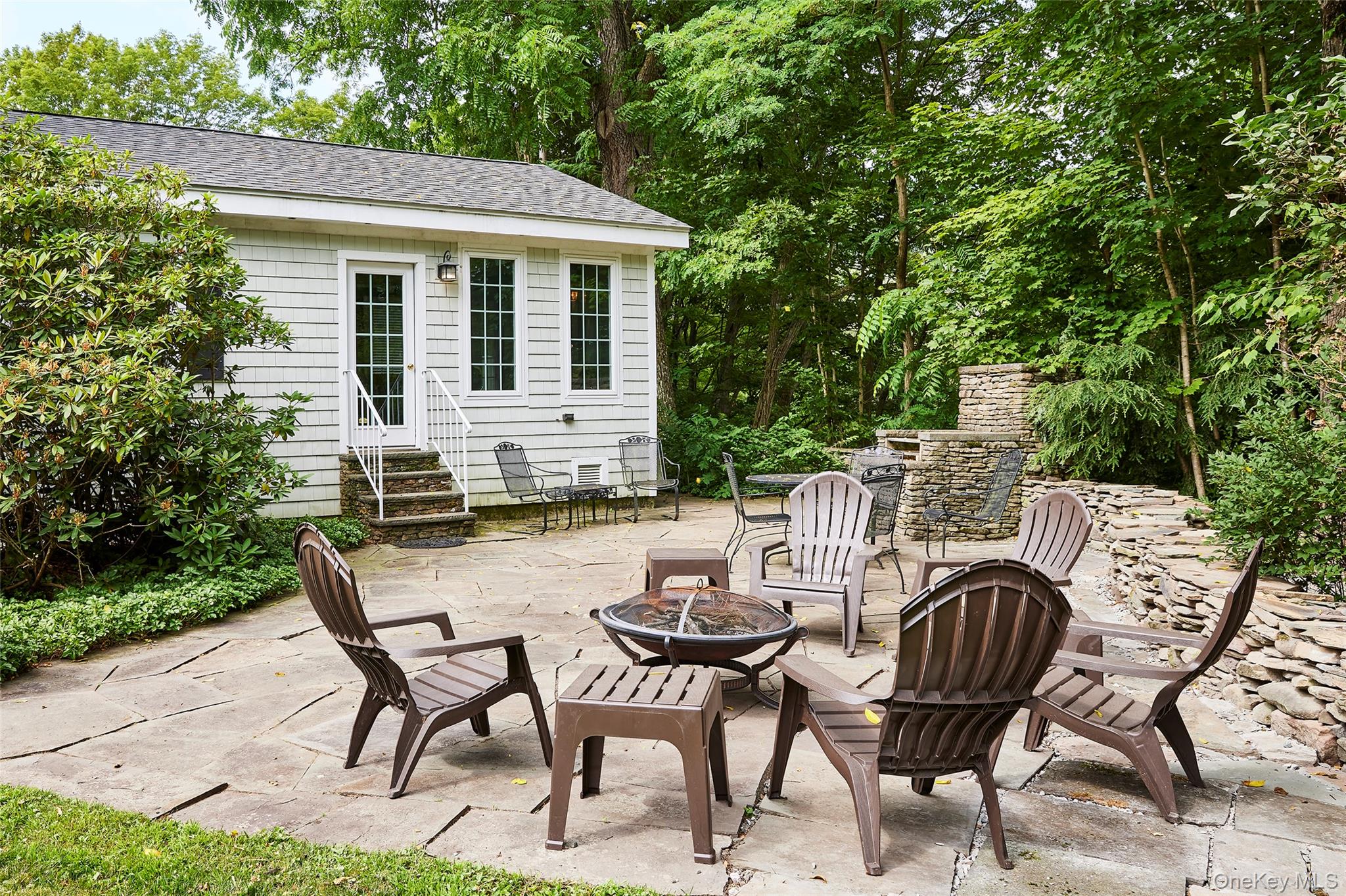 11 Harding Lane Roscoe, NY 12776 - Photo 4 of 48 a view of a patio with table and chairs with wooden floor and fence