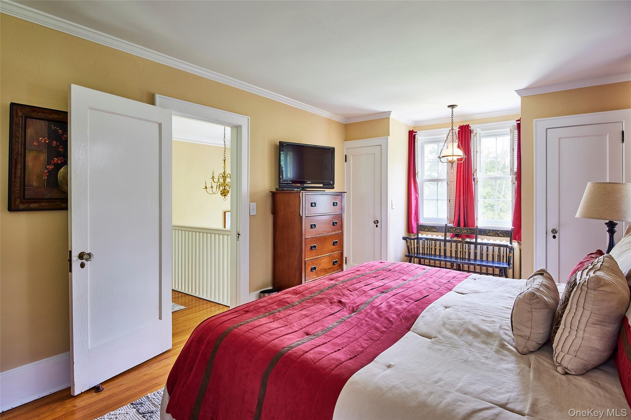 11 Harding Lane Roscoe, NY 12776 - Photo 42 of 48 a bedroom with a bed and a flat screen tv