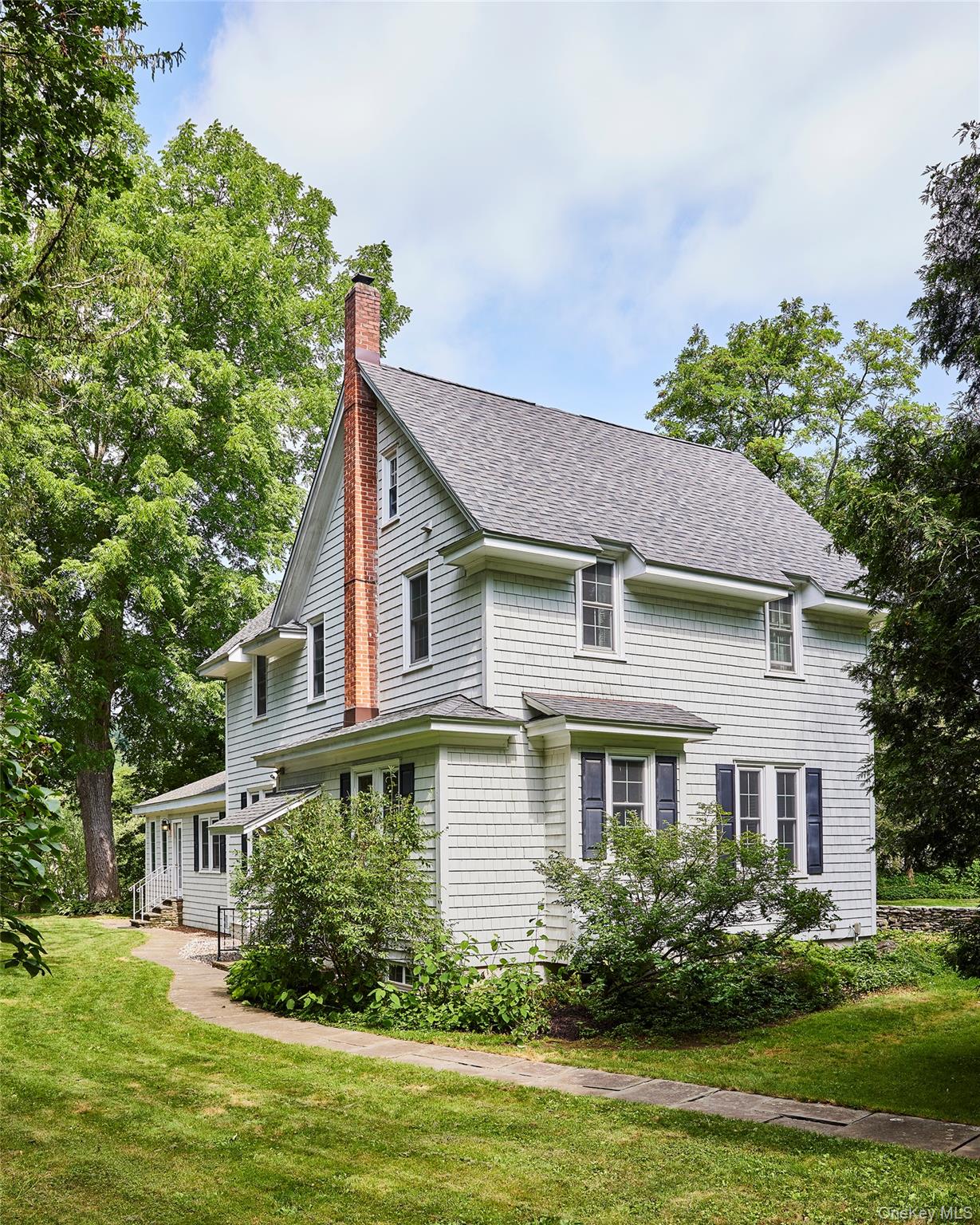 11 Harding Lane Roscoe, NY 12776 - Photo 8 of 48 a front view of a house with a garden