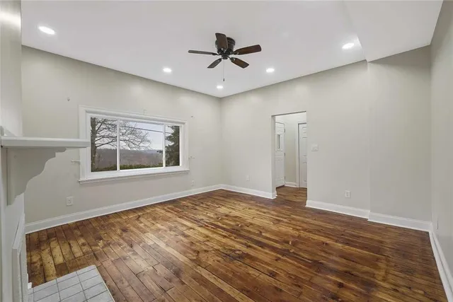 a view of a hallway with toilet