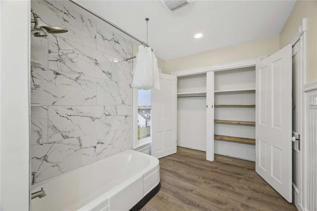 1617 West 9th Street Beaver Falls, PA 15010 - Photo 22 of 43 a bathroom with a bathtub and a shower