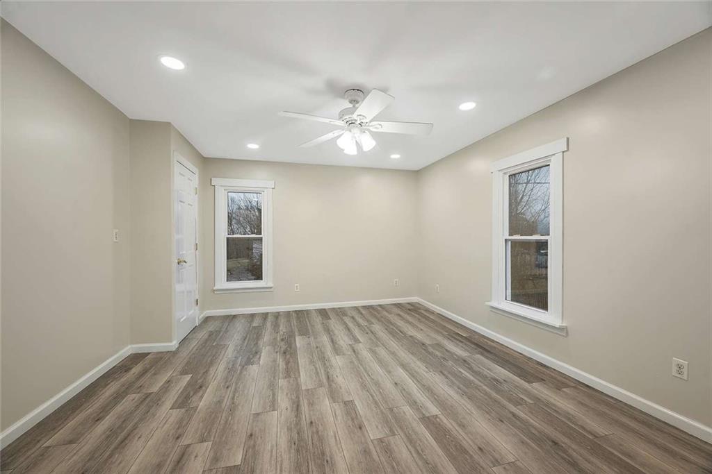 1617 West 9th Street Beaver Falls, PA 15010 - Photo 24 of 43 wooden floor in an empty room with a window