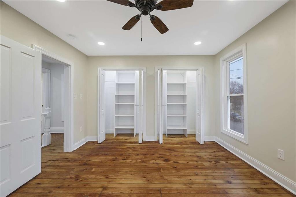 1617 West 9th Street Beaver Falls, PA 15010 - Photo 27 of 43 a view of empty room with wooden floor and window