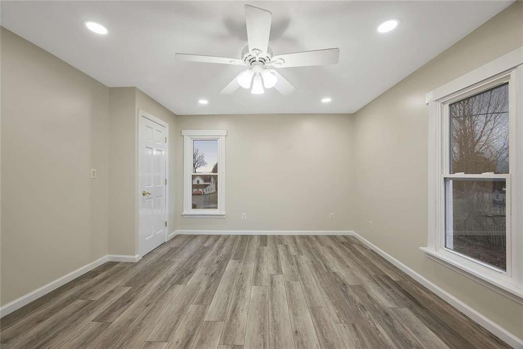 1617 West 9th Street Beaver Falls, PA 15010 - Photo 32 of 43 wooden floor in an empty room with a window