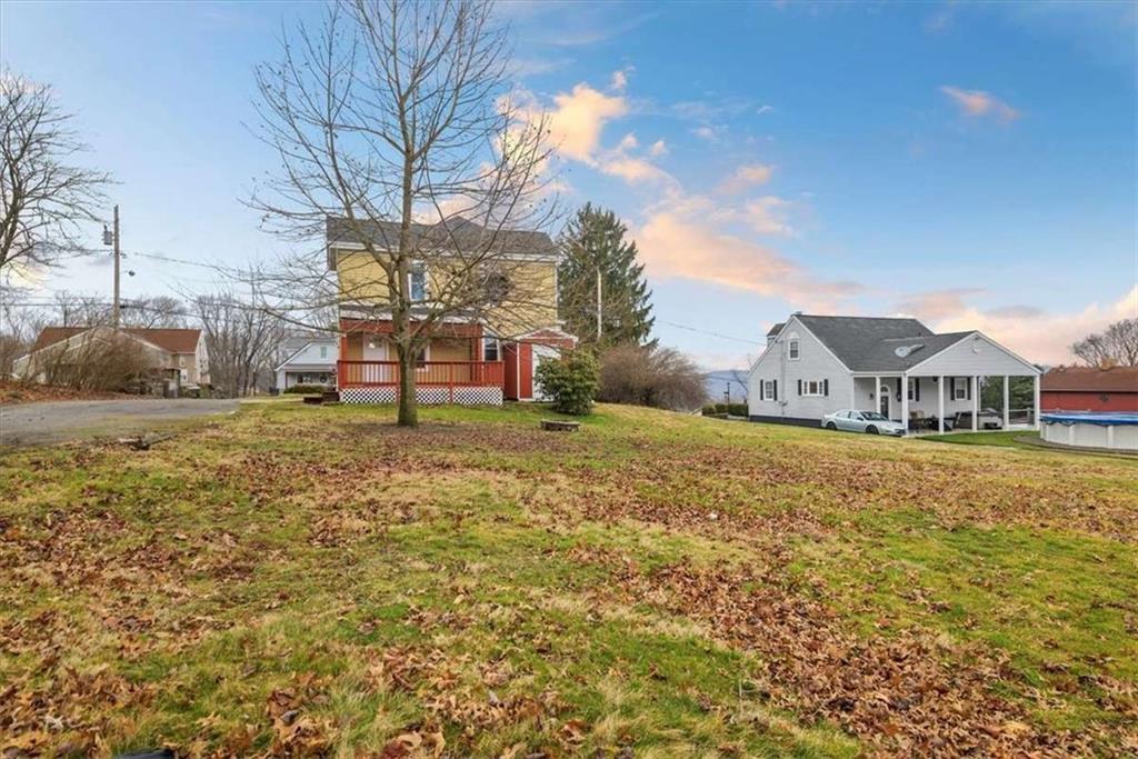 1617 West 9th Street Beaver Falls, PA 15010 - Photo 36 of 43 a view of a house with a yard