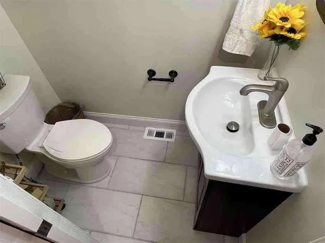 a bathroom with a sink and mirror