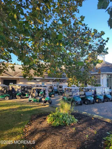 a view of a town with cars park