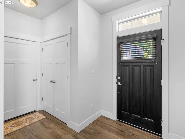 a view of storage and utility room with washer and dryer