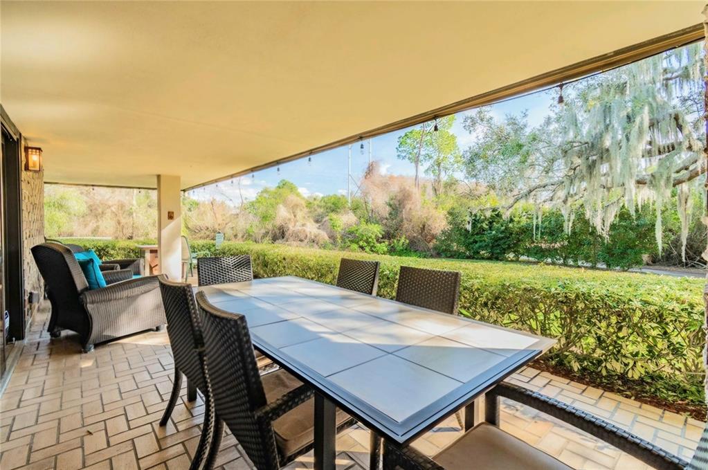 36750 Highway 19, Unit 82011 Palm Harbor, FL 34684 - Photo 14 of 15 a view of an outdoor space with furniture and garden