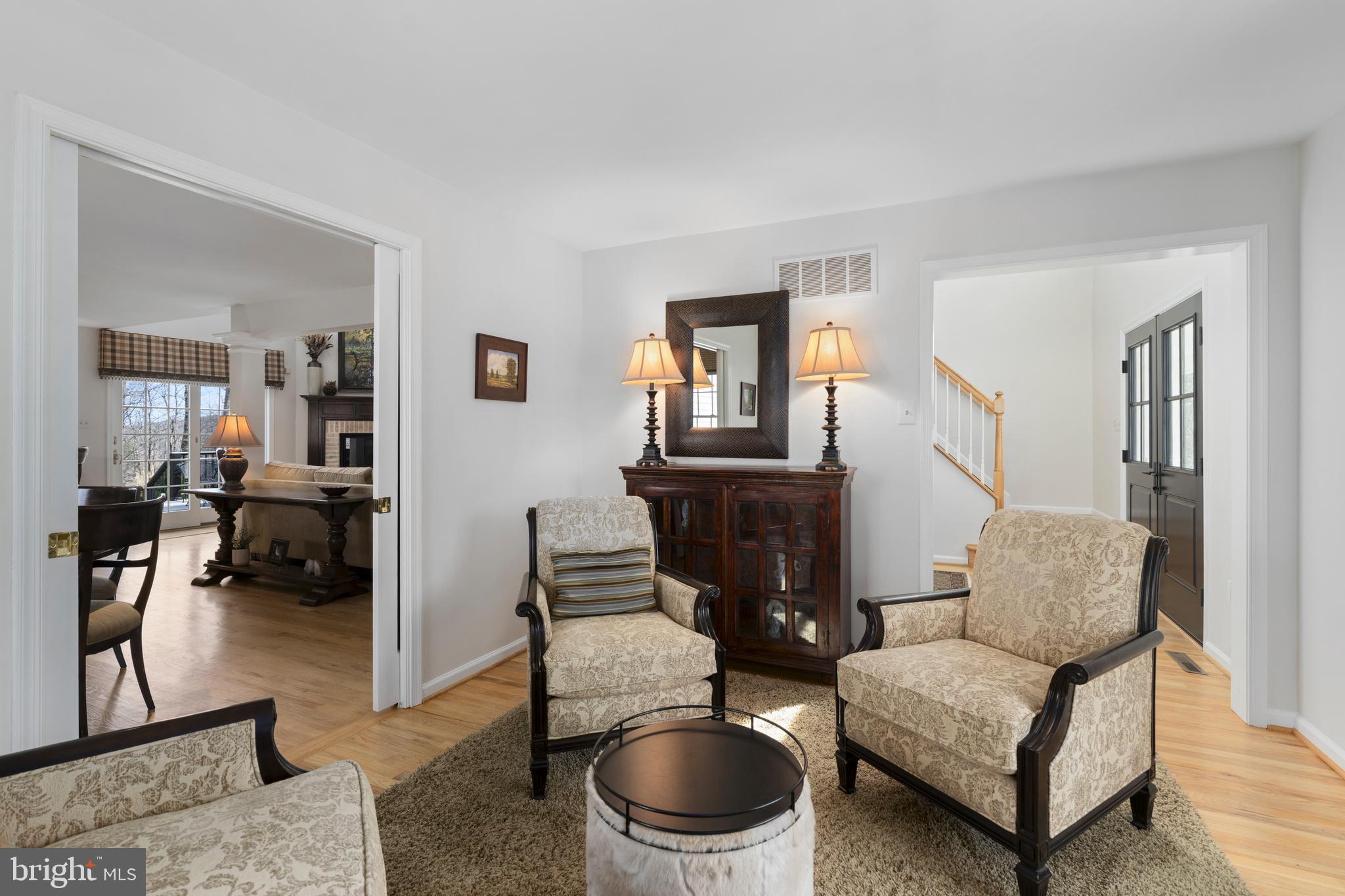 1116 Wiseburg Road Parkton, MD 21120 - Photo 22 of 54 a living room with furniture and a wooden floor