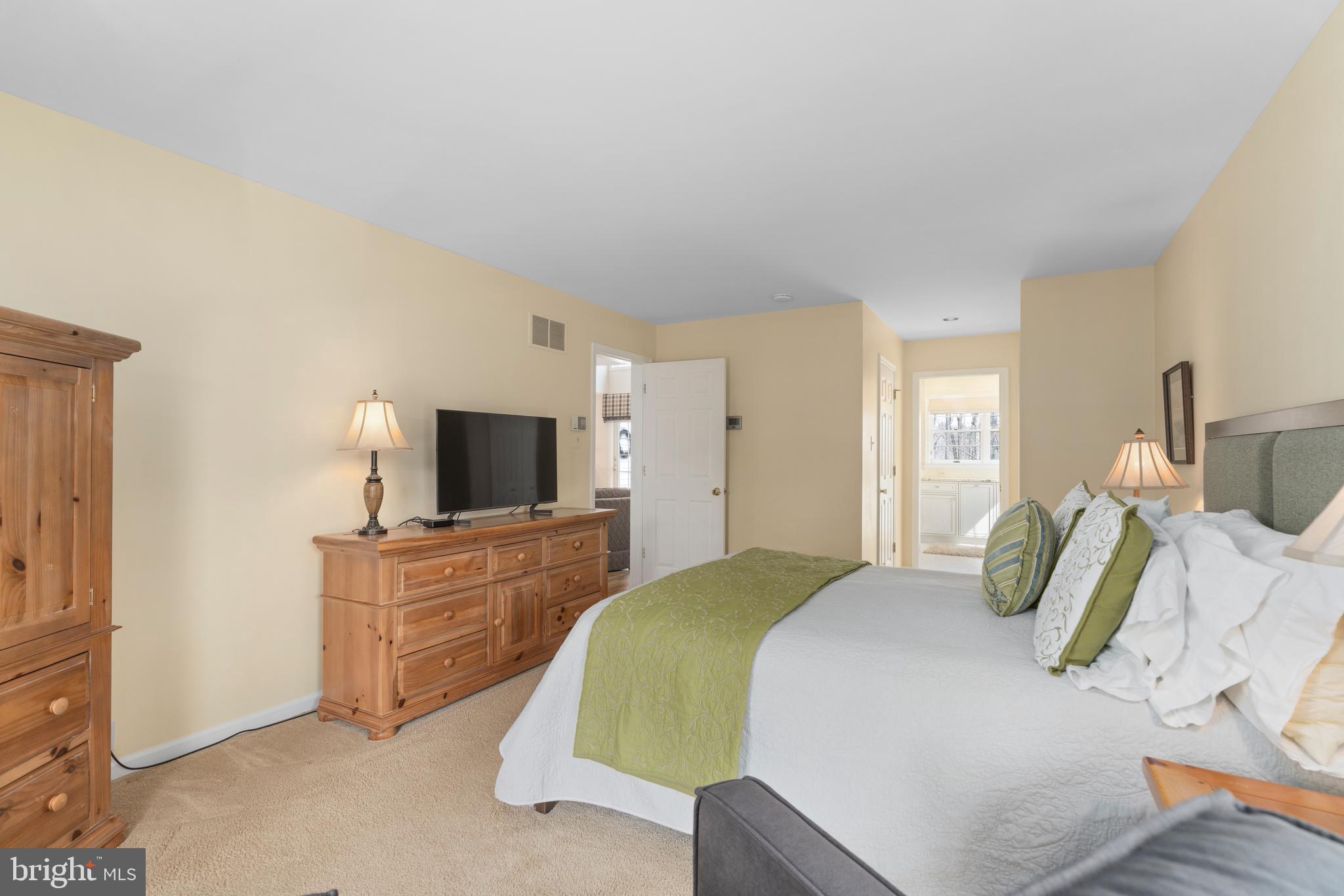 1116 Wiseburg Road Parkton, MD 21120 - Photo 26 of 54 a bedroom with a bed and flat screen tv