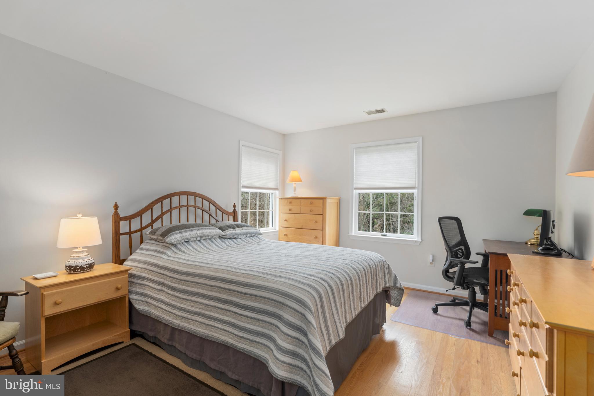 1116 Wiseburg Road Parkton, MD 21120 - Photo 32 of 54 a bedroom with a bed and a table in it