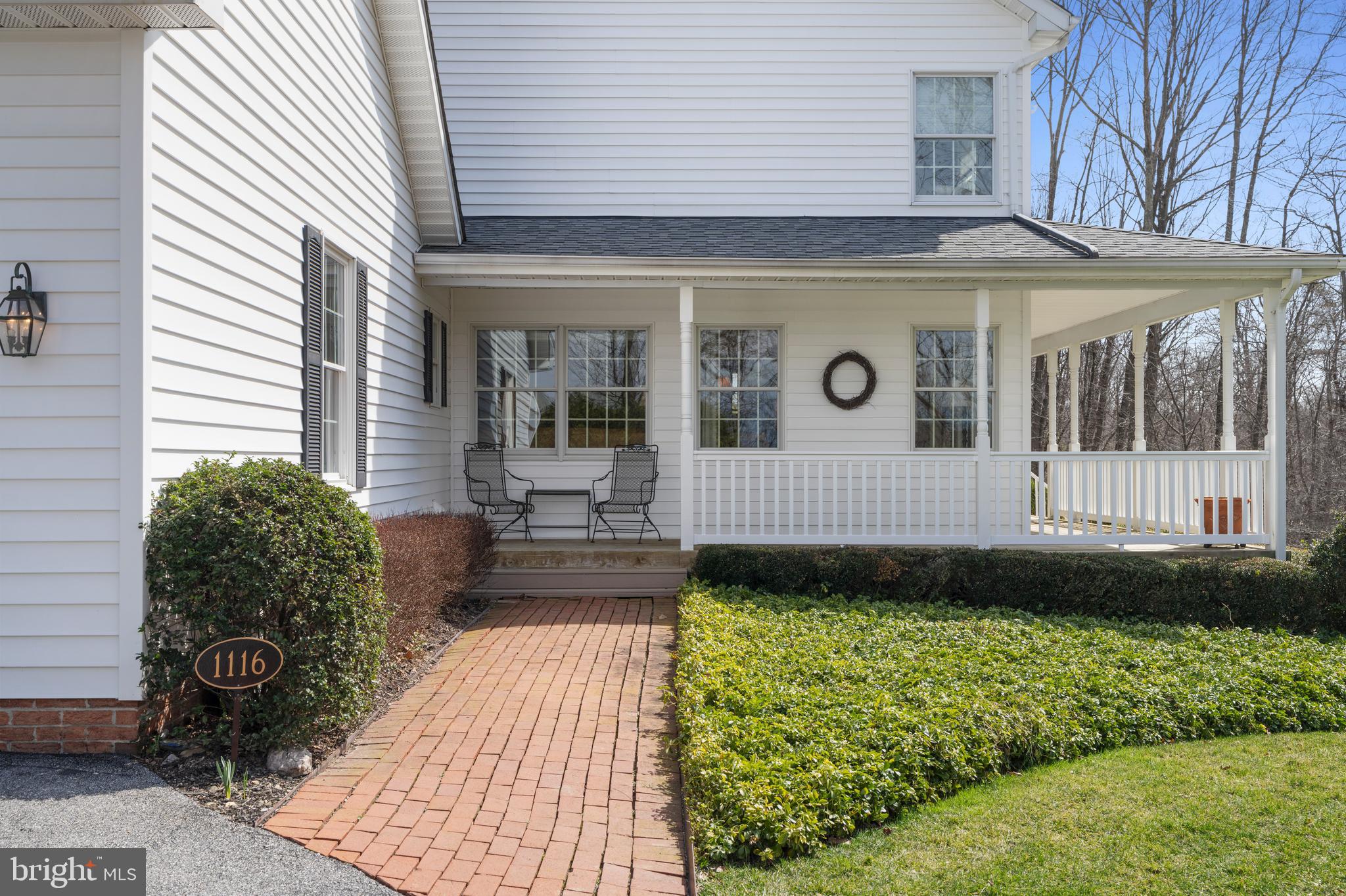 1116 Wiseburg Road Parkton, MD 21120 - Photo 4 of 54 a front view of a house with garden