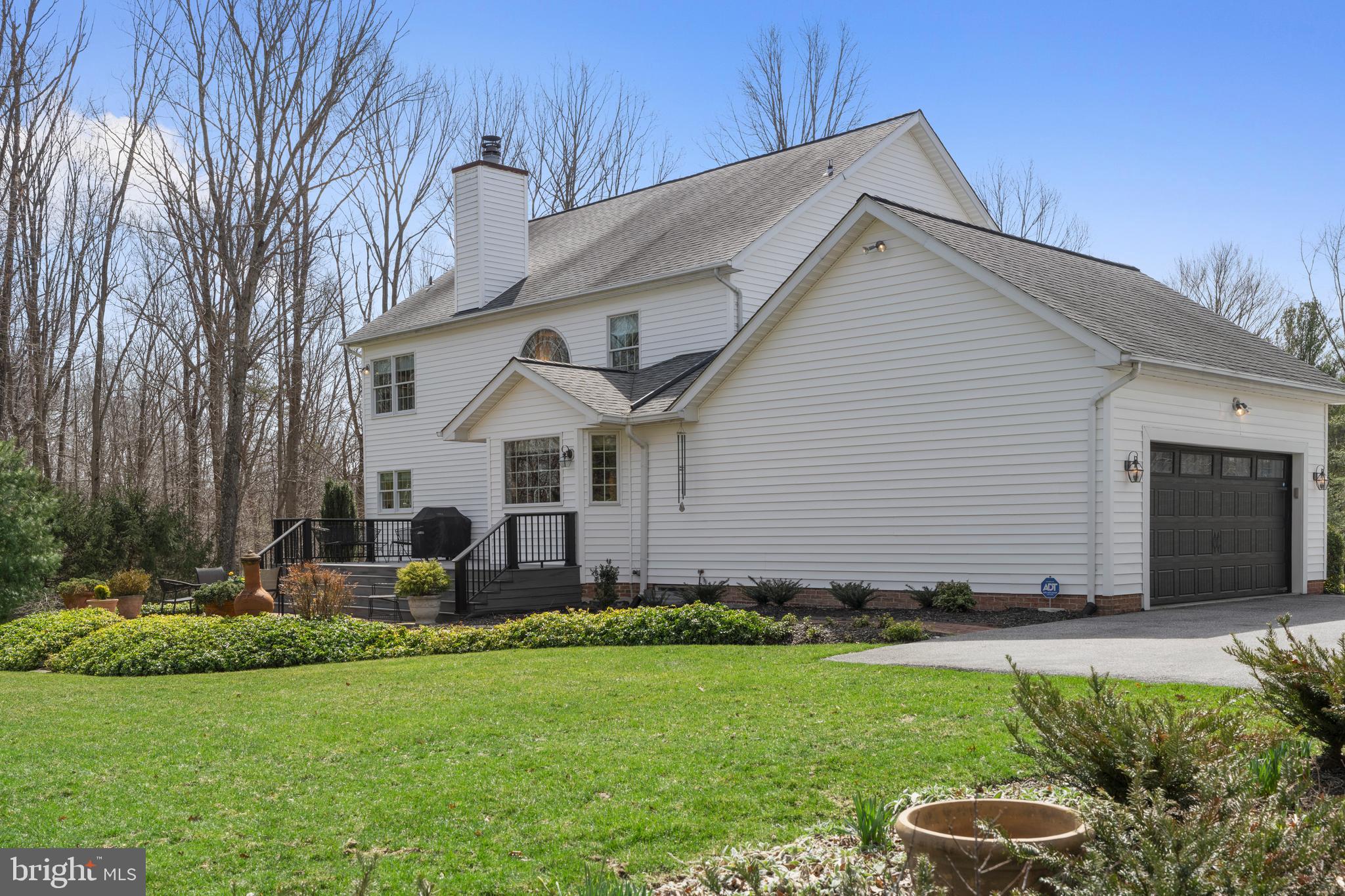 1116 Wiseburg Road Parkton, MD 21120 - Photo 51 of 54 a front view of house with a garden