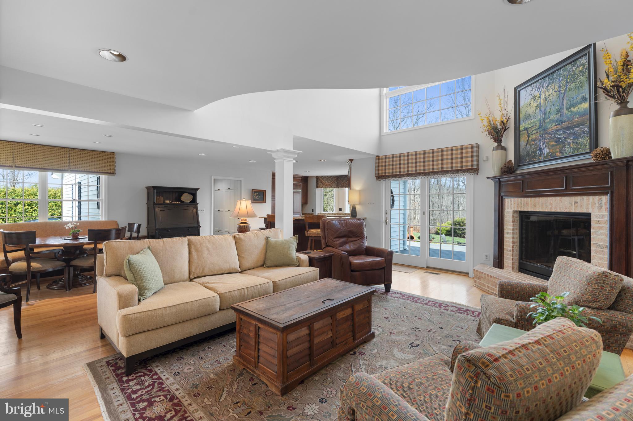 1116 Wiseburg Road Parkton, MD 21120 - Photo 10 of 54 a living room with furniture a large window and a fireplace
